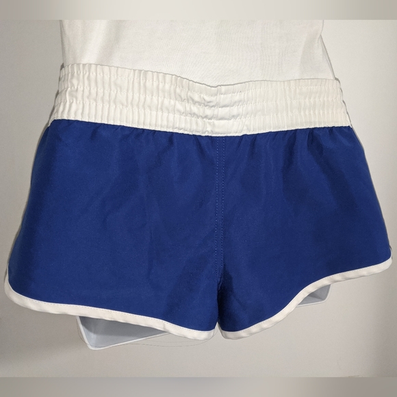 5/$25 Blue dolphin shorts white trim and with pockets - Picture 4 of 5
